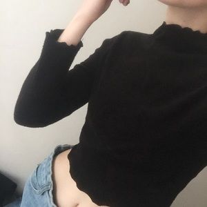 black crop with scalloped edges